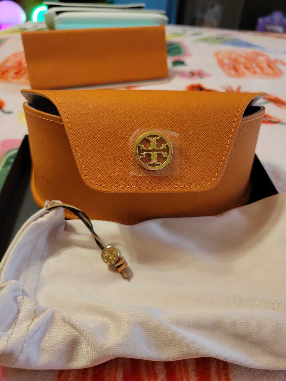 Tory Burch Orange Saffiano Leather Mini Case with Gold Logo. No Glasses